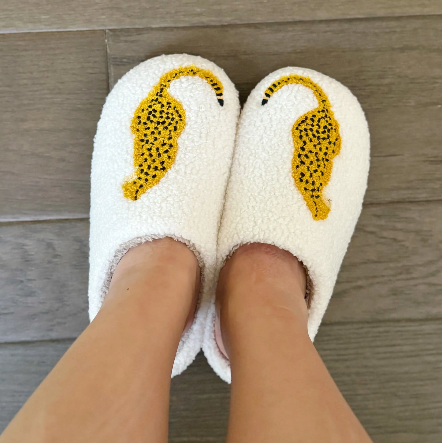 Roomix Cheetah Slippers-Step into comfort and style with the bold new Roomix Cheetah Slippers. Featuring a fierce cheetah illustration, these cozy slippers bring a playful edge to your homewear game