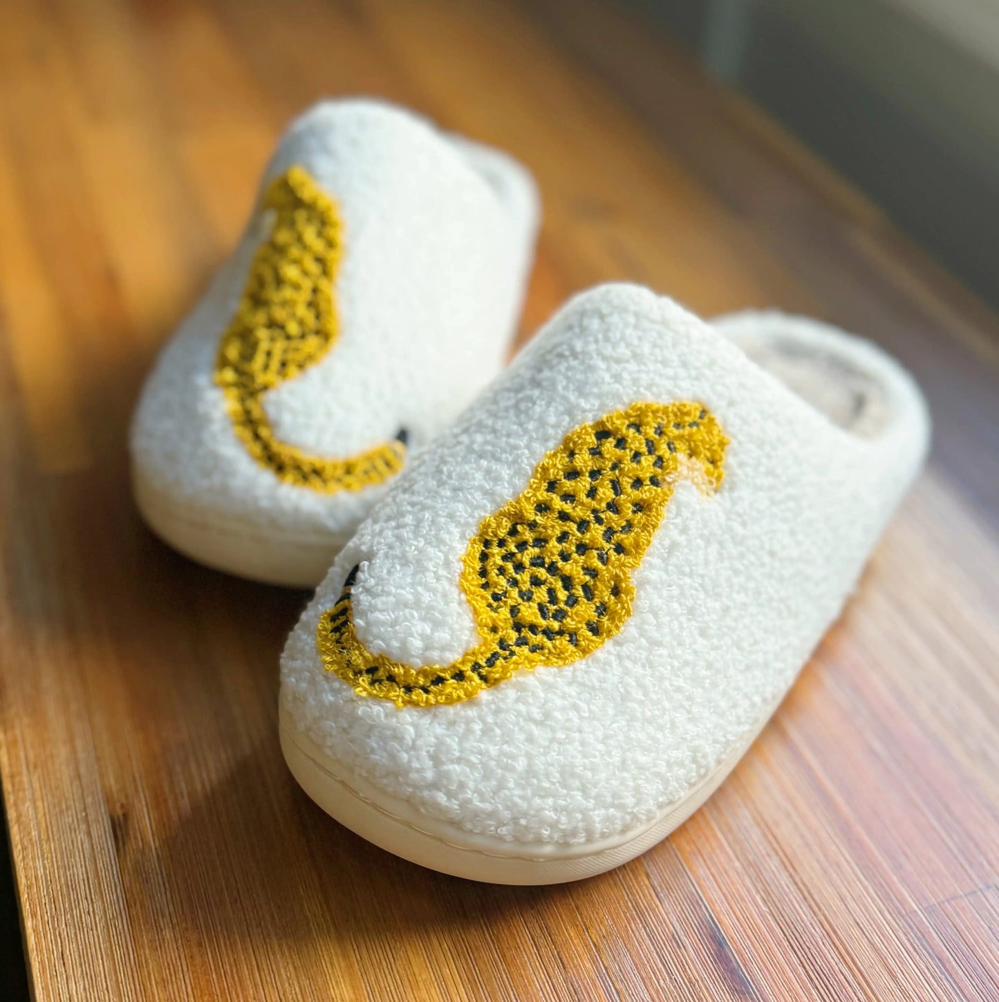 Roomix Cheetah Slippers-Step into comfort and style with the bold new Roomix Cheetah Slippers. Featuring a fierce cheetah illustration, these cozy slippers bring a playful edge to your homewear game